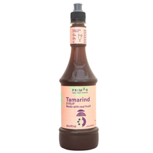 Load image into Gallery viewer, Bottle of Primor Tamarind syrup with a pink label on a white background